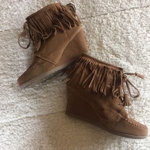 Worn moccasin booties